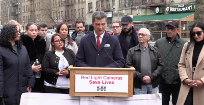 DOT Commissioner Ydanis Rodriguez speaking at a March 20 press conference asking for a renewal, and expansion, of NYC’s red-light camera program.