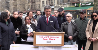 DOT Commissioner Ydanis Rodriguez speaking at a March 20 press conference asking for a renewal, and expansion, of NYC’s red-light camera program.