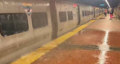 A poster on X shows rain pouring onto a Metro North train inside Grand Central on July 31.