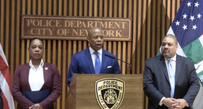 <b>Police Commissioner Keechant Sewell (left) Mayor Eric Adams (at mic) and Manhattan D.A. Alvin Bragg speak at a press conference providing an update on a case in which members of the LBGTQ community and others were targeted by a theft ring, that also resulted in two murders.</b> Photo: NYC Mayor Eric Adams<b> </b>Twitter.
