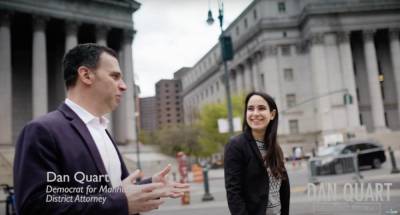 In a still from the ad, Dan Quart appears with Leah Herbert, a founder of the Sexual Harassment Working Group.