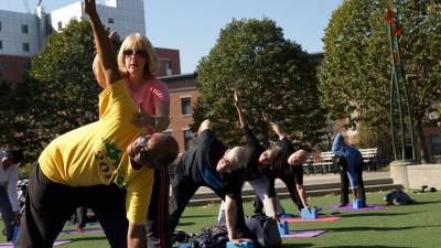 Yoga classes continue at Carl Schurz Park and other spots around the city, thanks to the City Parks Foundation. Photo courtesy of City Parks Foundation