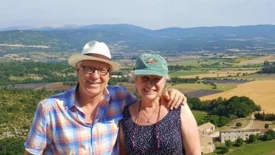 Our puzzle man, Myles Mellor (left), and his wife Debby--who initially urged him not to quit his day job--is now his biggest fan after he turned his one time hobby of creating crossword puzzles into a lucrative worldwide business. Photo: Courtesy Mellor family