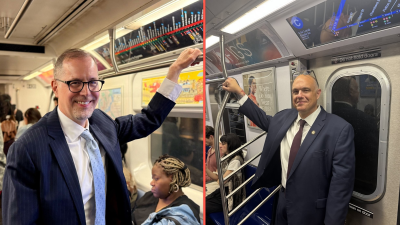 Comptroller candidates Mark Levine (left) and Justin Brannan (right) pose for their subway lives bonafides.