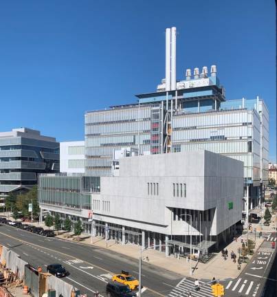 The taller of the two new Columbia University buildings pictured contains a Broadway entrance to Manhattanville Market, a new 4,000 square foot food destination. Photo: Ralph Spielman