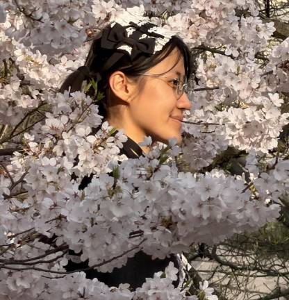 Jessie Sui (known by her tens-of-thousands of social media followers as “Snap Toks”) experiencing the blossoms for the first time