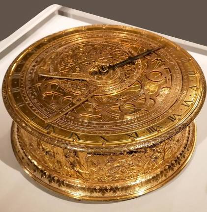 This Astronomical Clock with Orpheus Frieze on loan from The Adler Planetarium in Chicago incorporates a clock and an astrolabe, so not only does it tell the hour, but also the age, phase, and aspects of the moon in its monthly cycle.