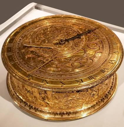 This Astronomical Clock with Orpheus Frieze on loan from The Adler Planetarium in Chicago incorporates a clock and an astrolabe, so not only does it tell the hour, but also the age, phase, and aspects of the moon in its monthly cycle.