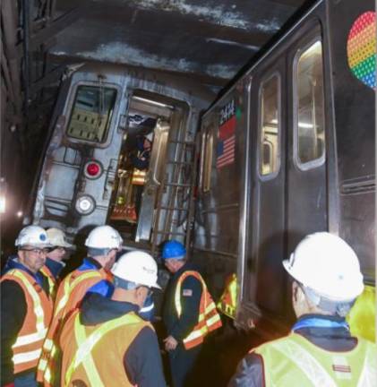 The derailment of two trains near the W. 96th St station on Jan. 5 is being blamed on a number of factors, including miscommunication between transit workers, according to a report by the National Transport Safety Board released Jan. 25. Photo: MTA