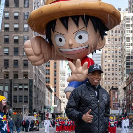 Mayor Adams in a For.NYC ball cap at Macy’s Thanksgiving Day Parade 2025.