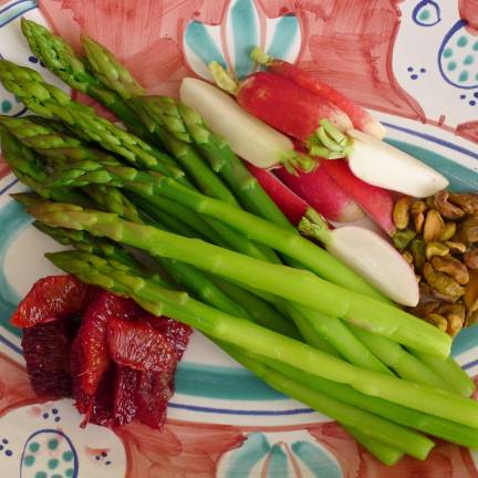 Asparagus, radishes, blood orange and pistachios combine with arugula to make a perfect spring salad.