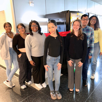 CUNY John Jay College and New York Birth Control Access Project student advocates pose in front of the new emergency contraception vending machine installed on their campus on Nov. 14.