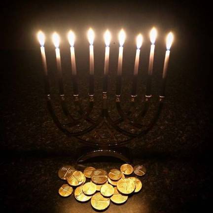Hankkah candles and gelt. Photo: Yvonne Esperanza, via flickr