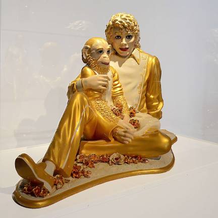 Jeff Koons combines high and low while reflecting on the opulence of porcelain in his &quot;Michael Jackson and Bubbles&quot; from 1998. Photo: Adel Gorgy