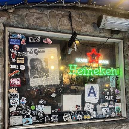 The bar was founded by Jimmy Glenn (pictured in news clipping), a boxer and boxing trainer, in the 1970s.