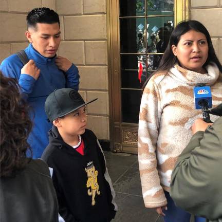 Asylum seekers, who began arriving at the Roosevelt Hotel in mid-town Manhattan over the summer, are entitled to enroll their children in NYC public schools. An estimated 20,000 headed into the system earlier this month. Photo: Keith J. Kelly