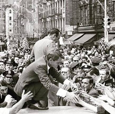 When Little Italy had a much bigger footprint, it attracted revelers and politicians. Here Robert F. Kennedy was mobbed when he made a campaign stop in 1964 while running for US Senate. Photo: San Gennaro Gallery