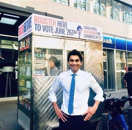 Suraj Patel in 2018 at a food cart with his New Blood slogan.