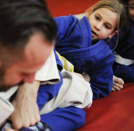 Matthew Fremon, lead instructor and co-owner at Upper West Side Kenshikai Karate and his daughter, Maya, recently started their new YouTube Series after being featured on LegLocker. Photo courtesy of Upper West Side Kenshikai Karate