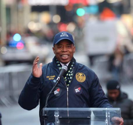 Mayor Eric Adams sports a NYC Nation cap at the kickoff press conference for the “We Love NYC” marketing campaign. Photo: Steve Sands/NY Newswire