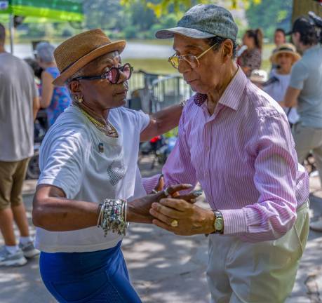 Attendees dance together at the Harlem Meer Performance Festival in 2025.
