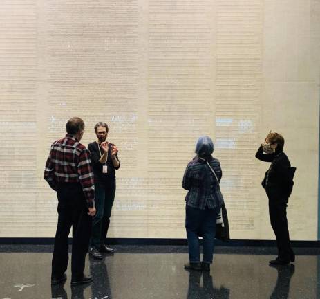 A tour docent points out one of the details at the Center for Jewish History. Photo: Courtesy of the Center of Jewish History
