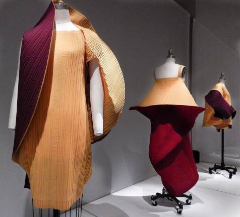 Gallery view of Issey Miyake's ingenious &#x201c;Rhythm Pleats&#x201d; dresses which fold to flat geometric shapes. Photo: Adel Gorgy