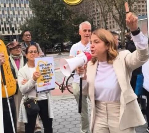 Community activist Layla Law Gisiko at a demonstration oppossing the demolition of the Chelsea NYCHA houses.