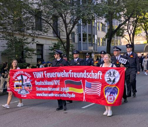 FDNY Feuerwehrfreundschaft, boasting camaraderie with Germany’s firefighters, at the Steuben Day Parade.