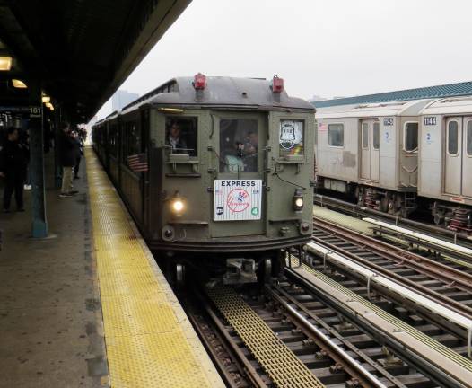 Lucky Yankee fans rode in style in 1917 subway cars nonstop from Grand Central to Yankee Stadium. Some waited on the uptown platform at the Manhattan station for an hour for a chance to ride on this train.
