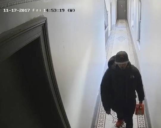 Hamilton Heights arsonist Jelani Parker inside 565 W. 144th St., Nov. 17, 2017.