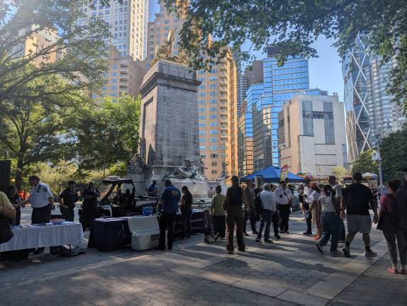 NYPD and other groups set up tables for Central Park Precinct Night Out Against Crime.