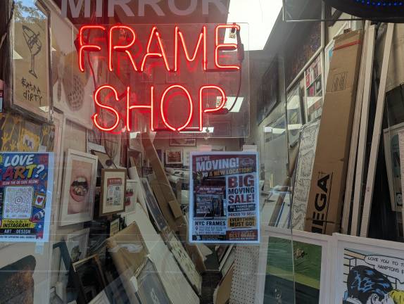 Moving sale sign at NYC Frames.