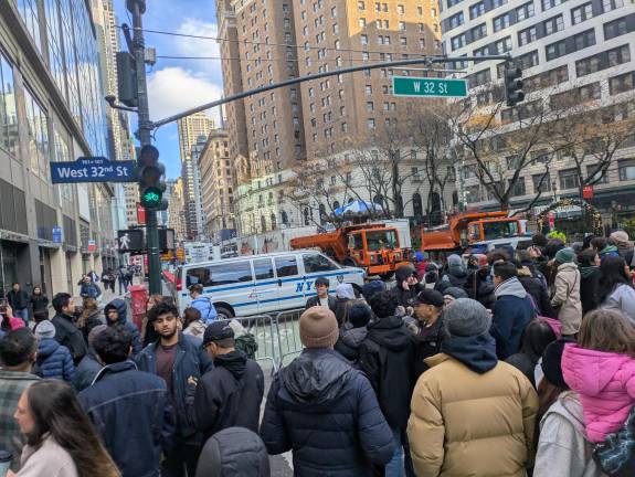 Thanksgiving Day Parade crowd control at West 32nd Street.