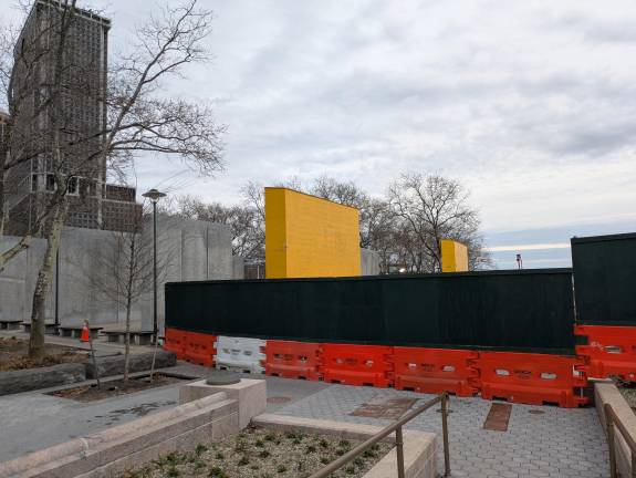 The East Coast Memorial, two wall clad in yellow wood as the Battery Park Brouhaha rages nearby.