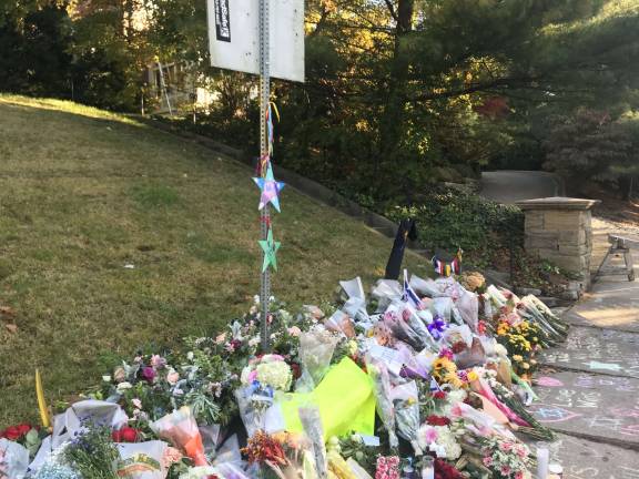 These &#x201c;Stars of Hope&#x201d; adorn a makeshift memorial a block or two from the Tree of Life Congregation in Pittsburgh on Tuesday. They were painted by the children and parents of Congregation Rodeph Sholom on the Upper West Side as an offering of love and a display of solidarity with the grieving Jewish community of Squirrel Hill. Photo: Jeff Parness / Stars of HOPE Program