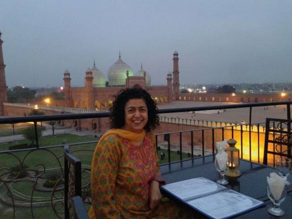 Sabeeha Rehman in March at a rooftop restaurant overlooking the Badshahi Mosque in Lahore, Pakistan. Photo courtesy of Sabeeha Rehman