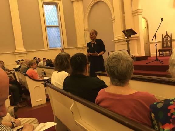 Leecia Eve, a Port Authority commissioner and ex-legal adviser to Hillary Clinton and Gov. Andrew Cuomo, addresses members of 10 Democratic political clubs as she campaigns for state attorney general in an East Side church last week. Photo: Douglas Feiden