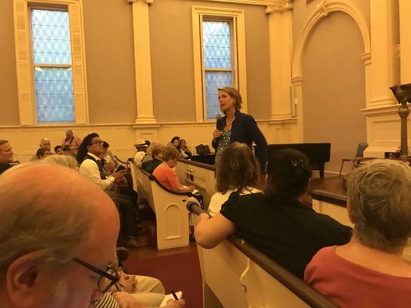 Zephyr Teachout, a law school professor who ran against Gov. Andrew Cuomo in 2014, takes to the stump in a Murray Hill church last week seeking the Democratic clubhouse vote as she campaigns for state attorney general. Photo: Douglas Feiden