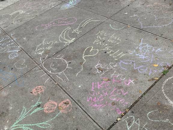 Customers left messages on the pavement in front of the store.