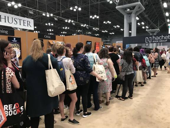 Book Expo attendees waiting in line for a signature from “Potato Pants” author Laurie Keller. Photo: Alizah Salario