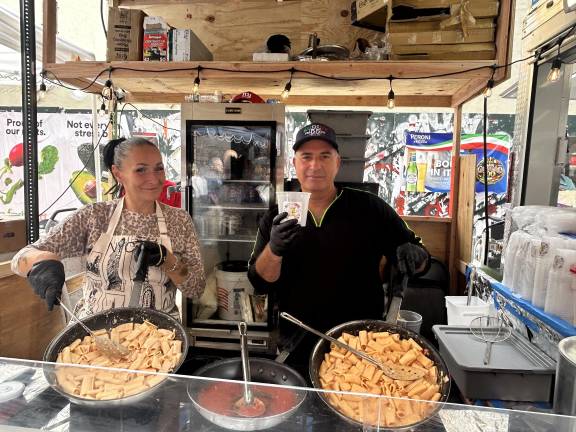 The owners of the new vendor Rigatoni On The Run prepare their pasta.