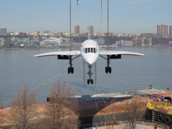 The Concorde with its classic needle nose was lifted by crane n March 14 as it returned to its home at the Interpid Air &amp; Space Museum at 12th Ave. and W. 46th St.