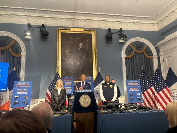 Mayor Eric Adams (center) and NYPD Commissioner Jessica Tisch (left) displayed some of the 2,200 illegal weapons seized so far in 2025 at a press conference on June 3. They also said the number of shootings and homicides through the first five months this year are at the lowest level in recorded history. The following day, two victims were shot dead in two incidents on the West Side.