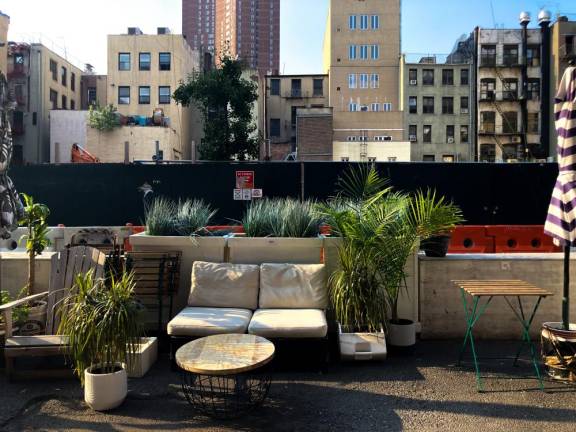 Outdoor seating in front of the shop entrance. Photo: James Pothen