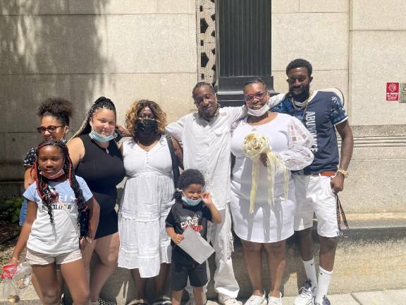 Audrea Estes-Williams and Charles Williams (second and third from right) with family members. Photo: Shantila Lee