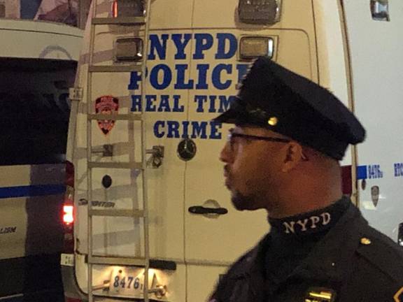 <b>NYPD calls in its Real Time Crime van after a shooting incident involving a suspect who fired at cops</b>. Photo: Keith J. Kelly