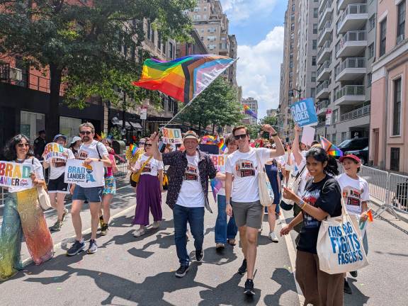 Flag waving former Comptroller Brad Lander. who recently won his Democratic primary race for Congress representing lower Manhattan, at NYC Pride March.