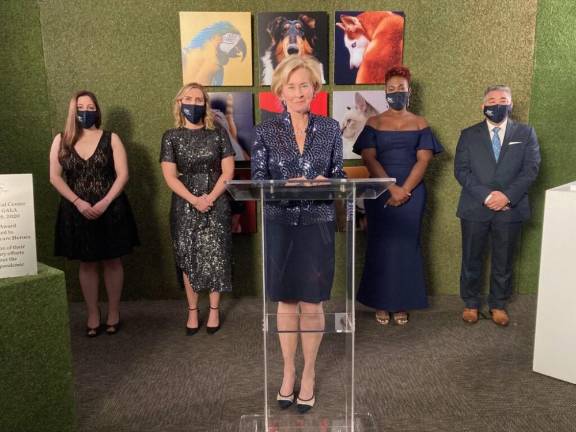 AMC CEO Kathryn Coyne (center) with this year’s Top Dog Gala honorees, the AMC Healthcare Heroes. Photo courtesy of AMC