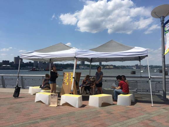The Uni Project's pop-up library&#xa0;at the AmpLit festival in Riverside Park. Photo: Elissa Sanci